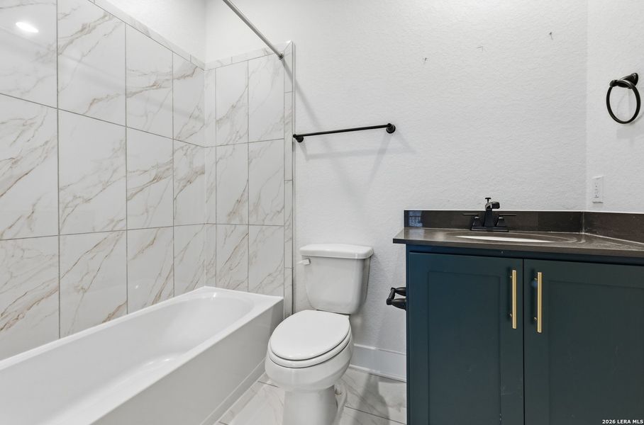 Furnished interior view inside a new home in Centero at Stone Oak, San Antonio (Image 8).