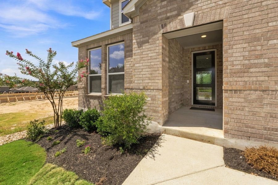 Exterior details and patio area of a home in River Bluff, Leander (Image 3). Exterior details and patio area of a home in River Bluff, Leander (Image 3).