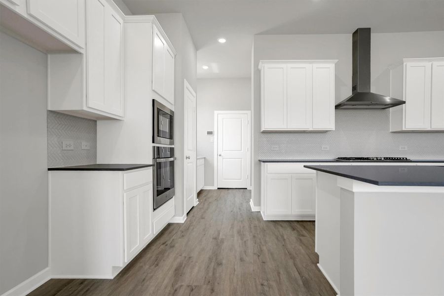 Furnished interior view inside a new home in Sunterra 50s, Katy (Image 6).