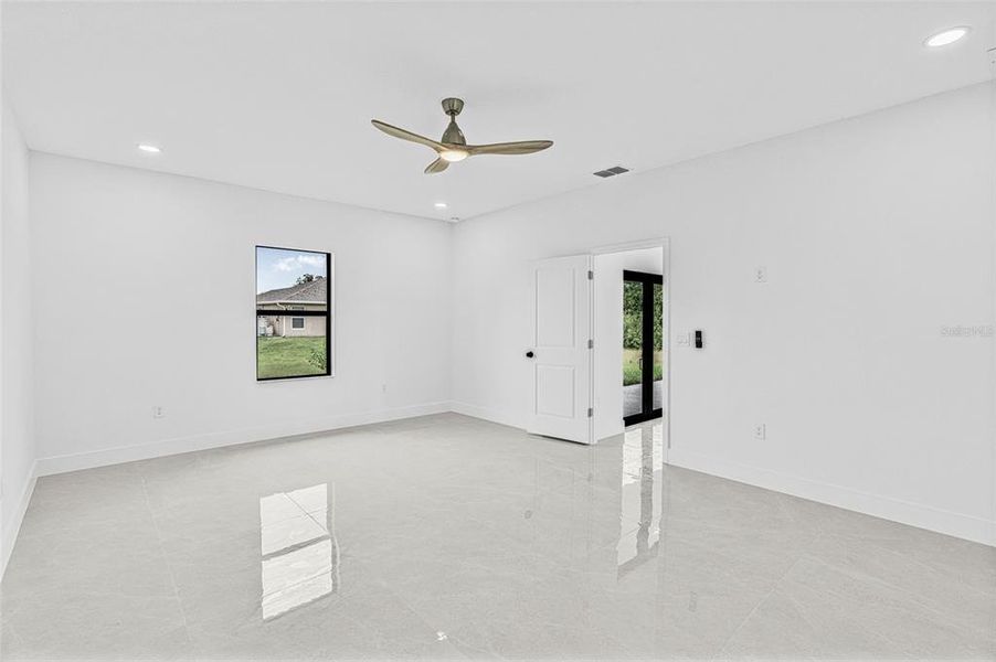 Spacious, unfurnished interior of a new home in , Lehigh Acres (Image 19). Spacious, unfurnished interior of a new home in , Lehigh Acres (Image 19).