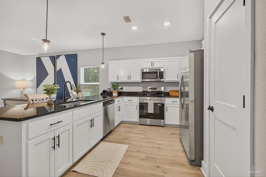 Furnished interior view inside a new home in Lexlee Estates, Pensacola (Image 5).