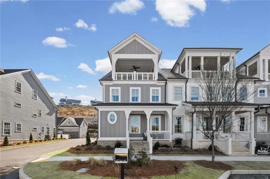 Front exterior of a new home in , Ball Ground, GA, highlighting curb appeal (Image 1). Front exterior of a new home in , Ball Ground, GA, highlighting curb appeal (Image 1).