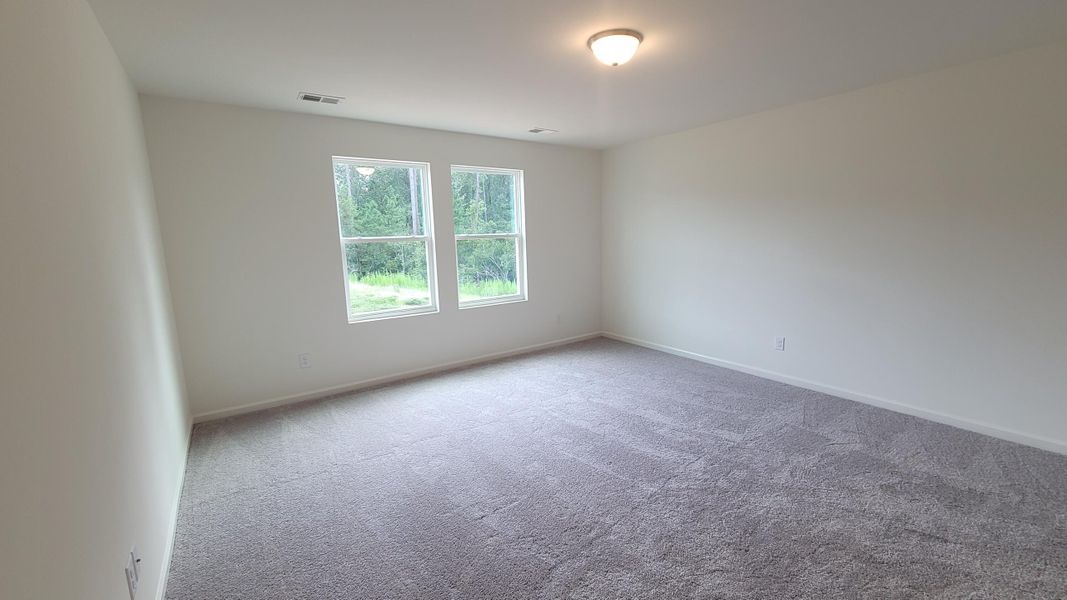 Spacious, unfurnished interior of a new home in Pender Woods at Cane Bay, Summerville (Image 7). Spacious, unfurnished interior of a new home in Pender Woods at Cane Bay, Summerville (Image 7).