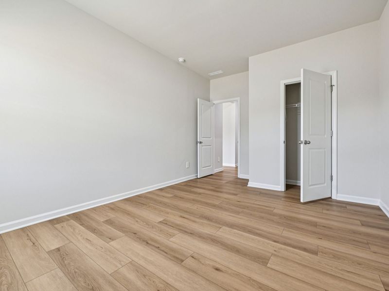 Spacious, unfurnished interior of a new home in Oak Manor - Signature Series, Garner (Image 10). Spacious, unfurnished interior of a new home in Oak Manor - Signature Series, Garner (Image 10).