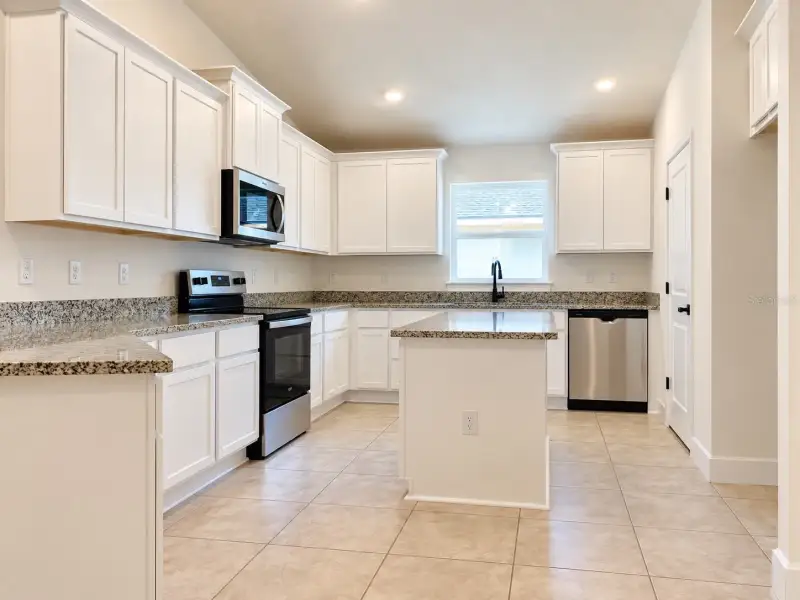 Furnished interior view inside a new home in Harmony Central, St. Cloud (Image 5).