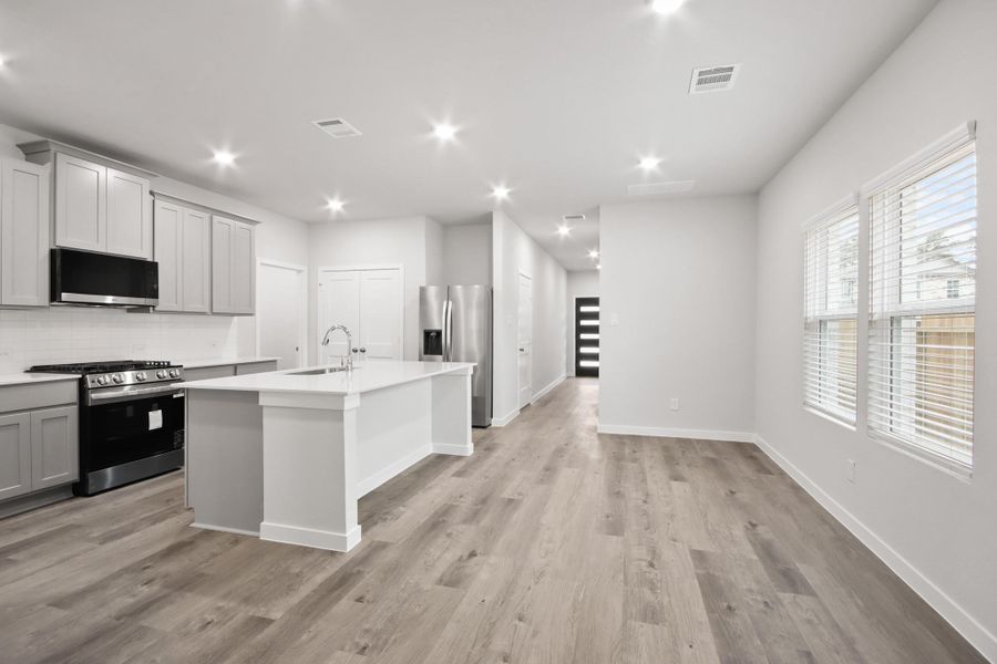 Furnished interior view inside a new home in Lakes at Black Oak, Magnolia (Image 7).