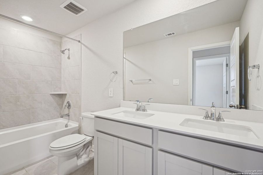 Furnished interior view inside a new home in Sagebrooke - Premier Series, San Antonio (Image 15). Furnished interior view inside a new home in Sagebrooke - Premier Series, San Antonio (Image 15).