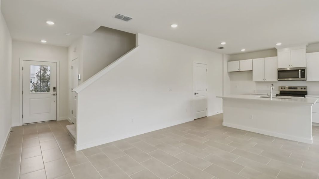 Furnished interior view inside a new home in Cyrene at Harmony, St. Cloud (Image 7).
