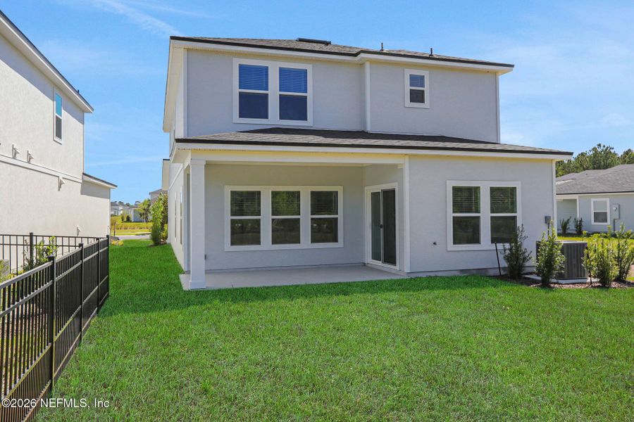 Exterior details and patio area of a home in Amberly, Green Cove Springs (Image 4).