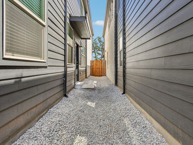 Exterior details and patio area of a home in Oak Ridge Park, Corinth (Image 3).
