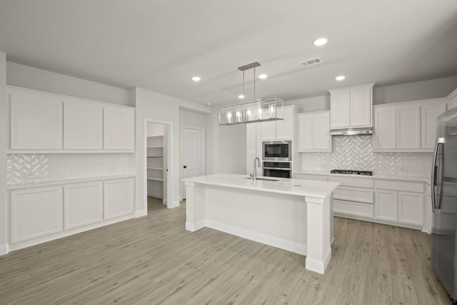 Furnished interior view inside a new home in Creekview Meadows, Pilot Point (Image 5).