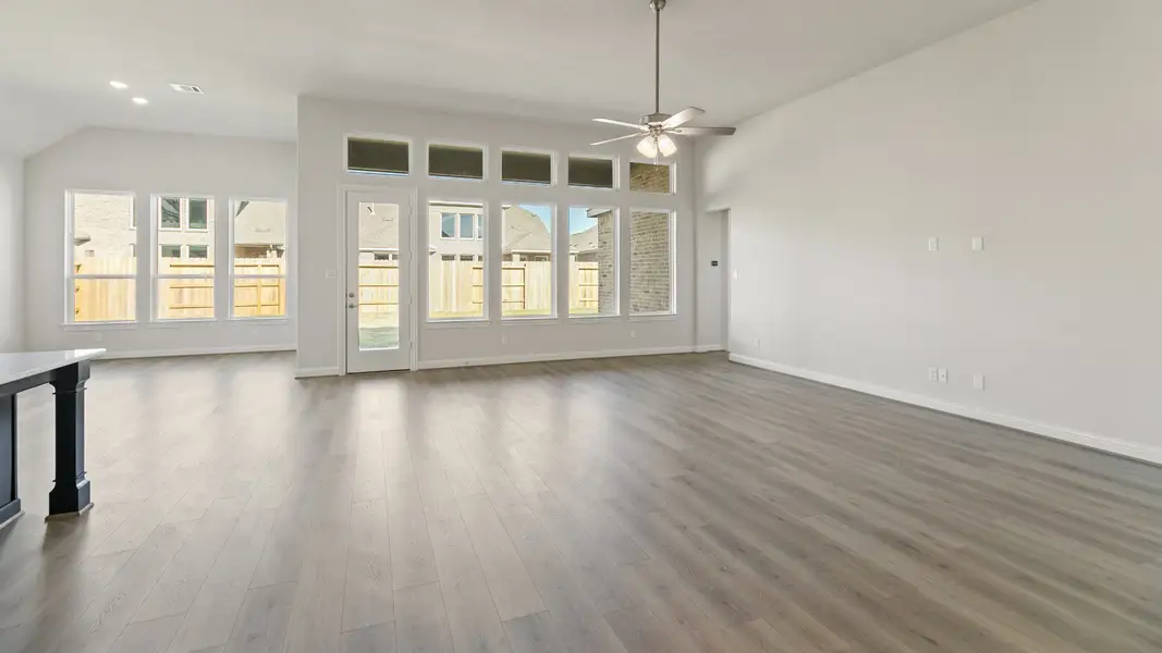 Representative furnished interior of a home built from the Yale by DRB Homes in Creekhaven, Iowa Colony (Image 5).