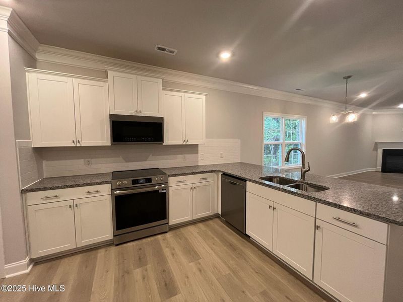 Furnished interior view inside a new home in Palmetto Creek, Bolivia (Image 5).