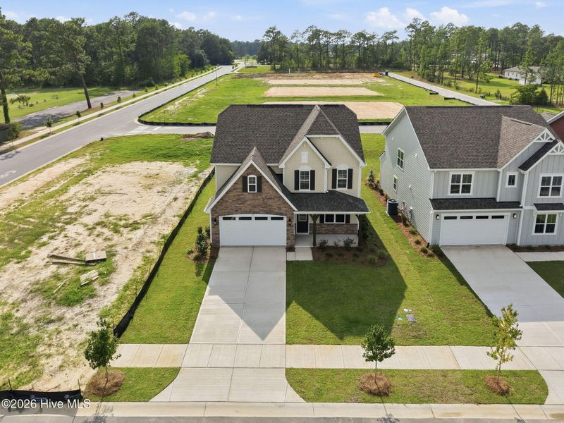 Front exterior of a new home in Legacy Lakes, Aberdeen, NC, highlighting curb appeal (Image 19).