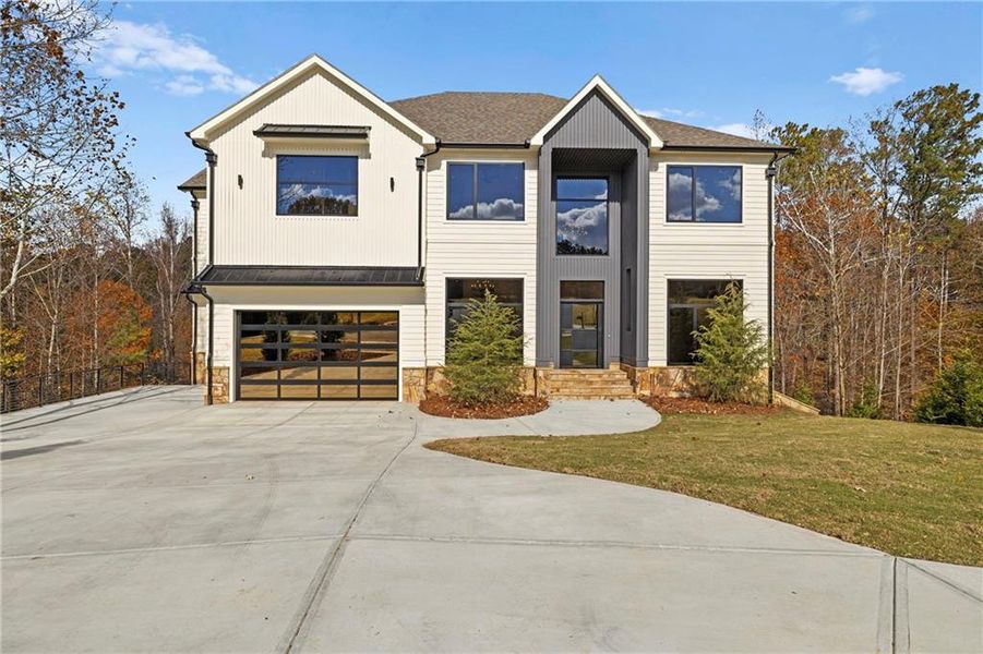 Front exterior of a new home in , Milton, GA, highlighting curb appeal (Image 28).