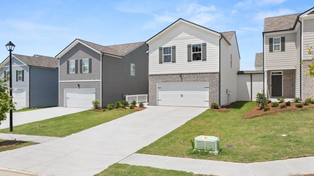Front exterior of a new home in Rolling Meadows, Jasper, GA, highlighting curb appeal (Image 21).