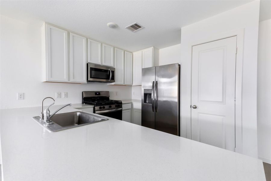Furnished interior view inside a new home in Tavola, New Caney (Image 7).