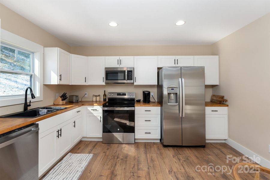 Furnished interior view inside a new home in , Asheville (Image 27).