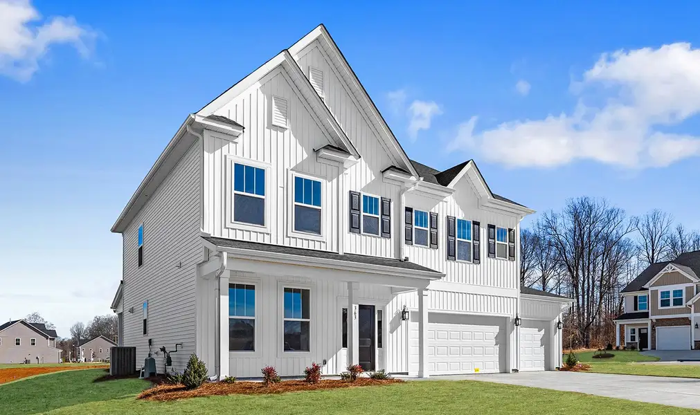 Front exterior of a new home in Fieldstone, Lexington, NC, highlighting curb appeal (Image 24).