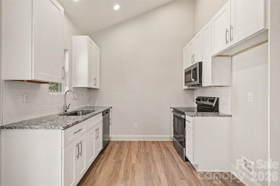 Furnished interior view inside a new home in , Monroe (Image 9).