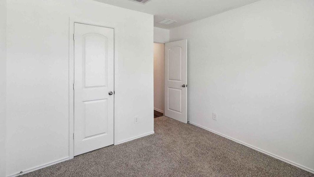 Spacious, unfurnished interior of a new home in Grand Pines, Magnolia (Image 13).