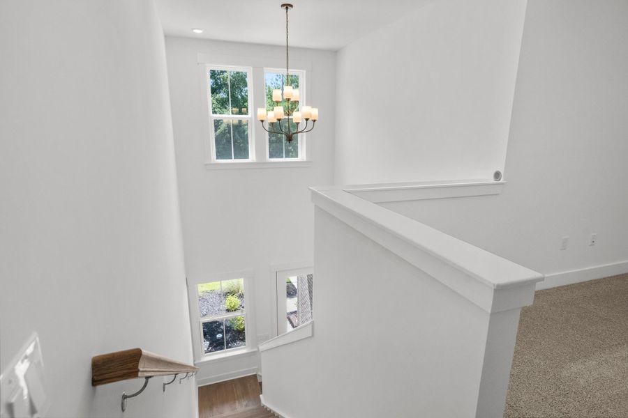 Spacious, unfurnished interior of a new home in Long Bay Golf Club, Longs (Image 33).