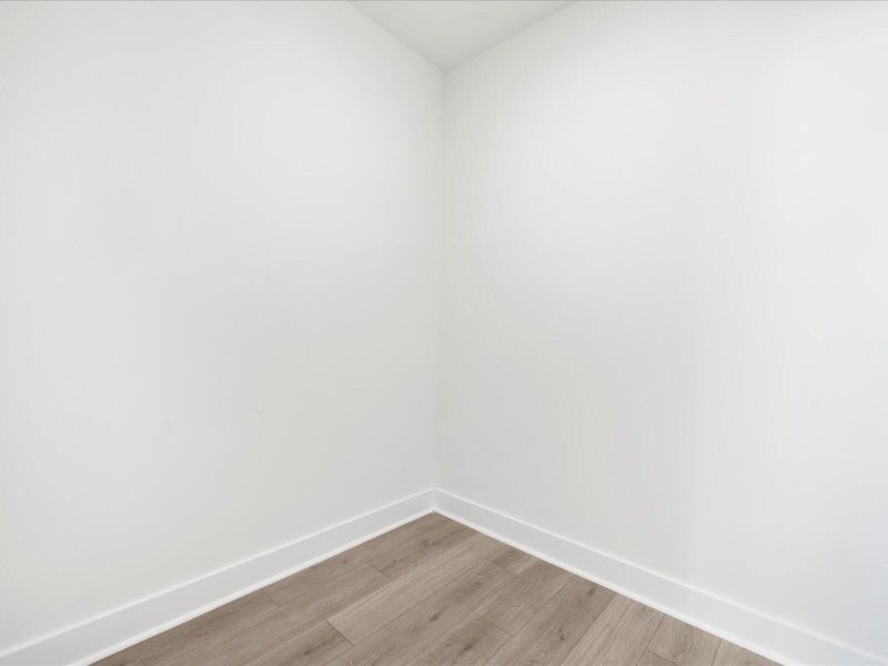 Spacious, unfurnished interior of a new home in The Coves at Lakes of Cane Bay, Summerville (Image 18).