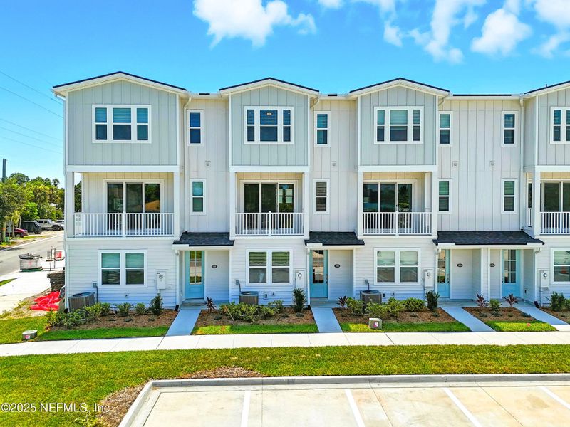 Front exterior of a new home in , Jacksonville Beach, FL, highlighting curb appeal (Image 22).