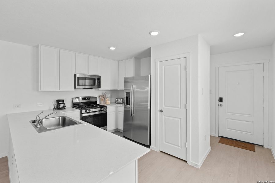 Furnished interior view inside a new home in Torian Village, San Antonio (Image 19).