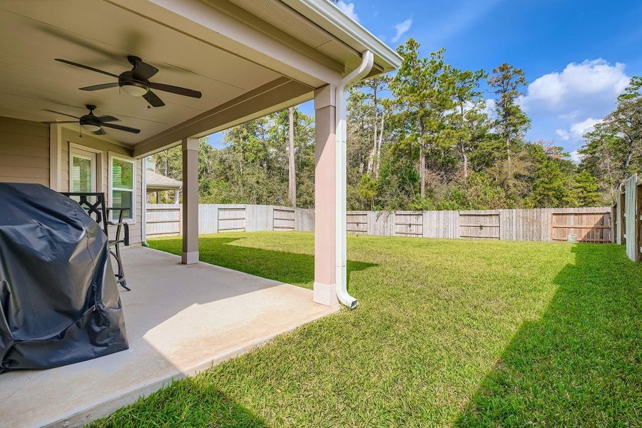 Exterior details and patio area of a home in , Spring (Image 4).
