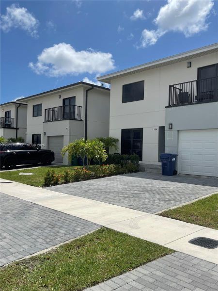 Front exterior of a new home in , Florida City, FL, highlighting curb appeal (Image 28).