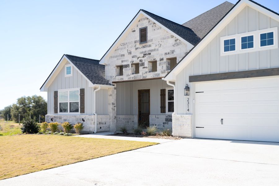 Representative exterior photo of a completed home built from the The Addison by Reece Homes in Pebble Creek, College Station, TX (Image 29).