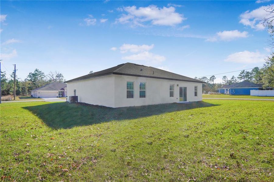 Exterior details and patio area of a home in , Citrus Springs (Image 27).