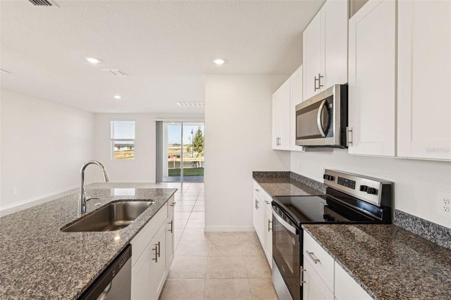 Furnished interior view inside a new home in The Reserve at Hammock Oaks - Classic Series, Lady Lake (Image 3).