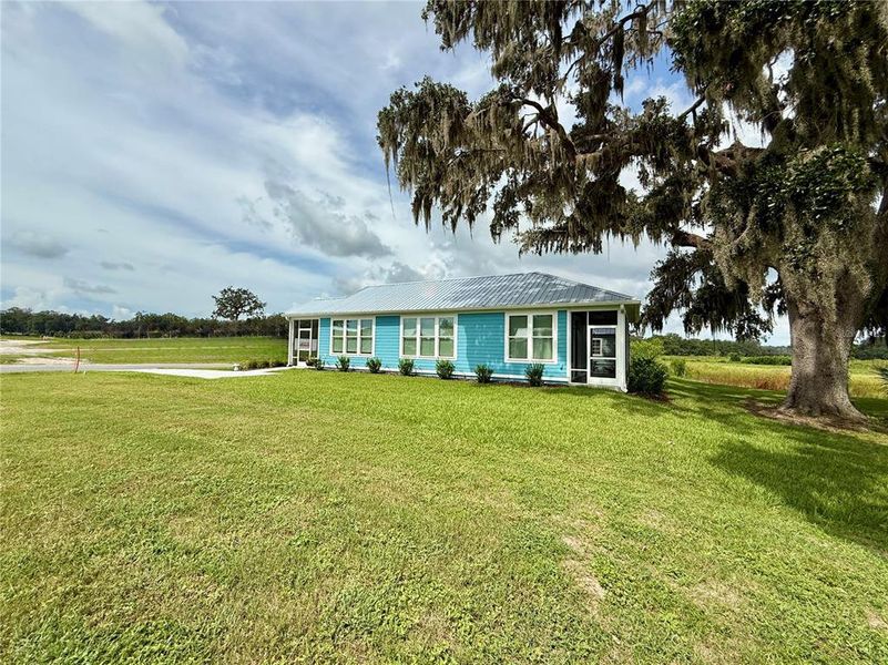Front exterior of a new home in , Oxford, FL, highlighting curb appeal (Image 19).