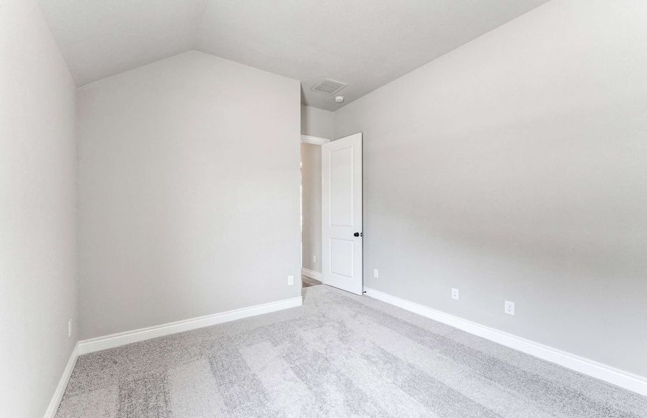 Representative unfurnished interior of a home built from the 2870 by Ravenna Homes in The Woodlands Hills 65′, Willis (Image 35). Representative unfurnished interior of a home built from the 2870 by Ravenna Homes in The Woodlands Hills 65′, Willis (Image 35).