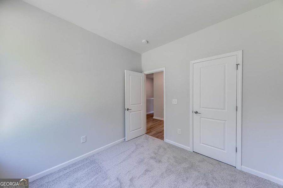 Spacious, unfurnished interior of a new home in Chimney Oaks Townhomes, Homer (Image 23). Spacious, unfurnished interior of a new home in Chimney Oaks Townhomes, Homer (Image 23).