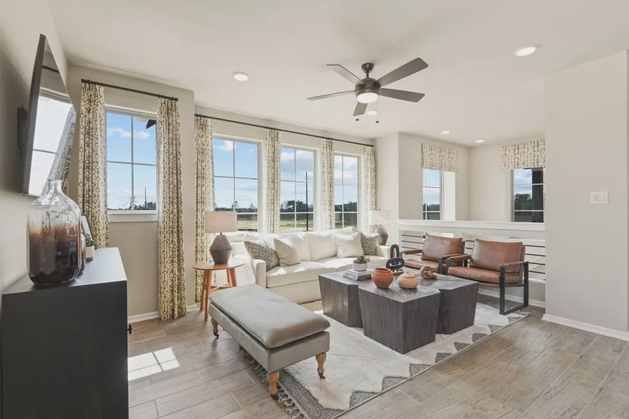 Representative furnished interior of a home built from the Springfield by Chesmar Homes in Balmoral, Humble (Image 10).