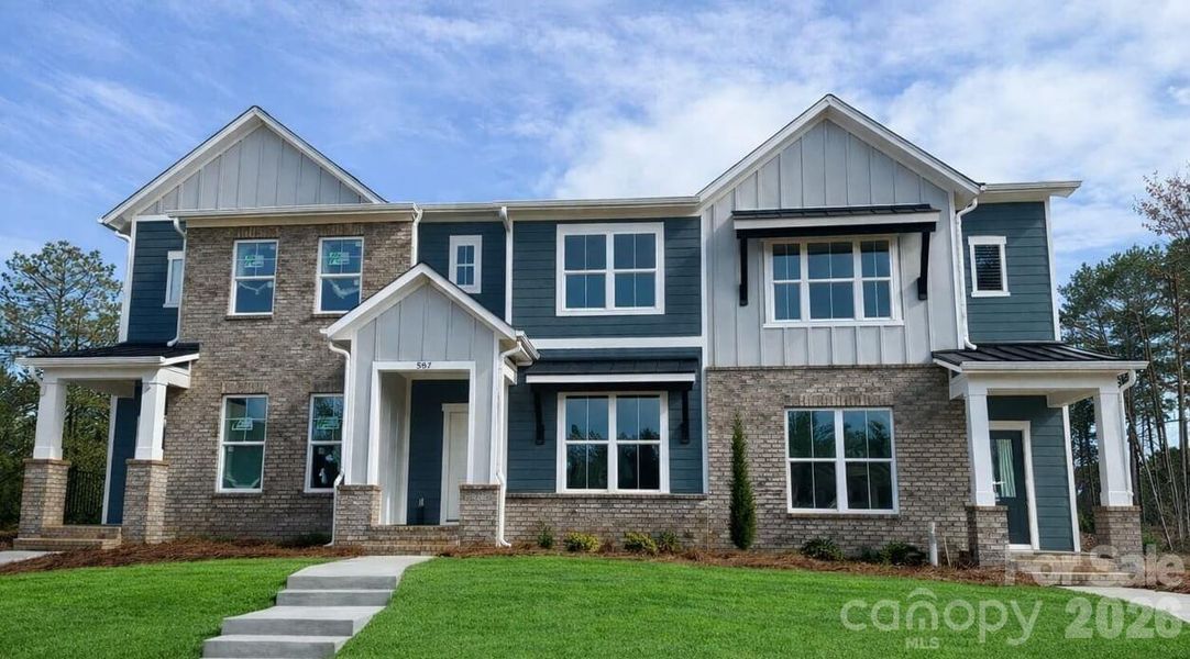 Front exterior of a new home in Hardy Pond, Rock Hill, SC, highlighting curb appeal (Image 1). Front exterior of a new home in Hardy Pond, Rock Hill, SC, highlighting curb appeal (Image 1).