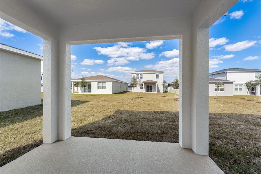 Exterior details and patio area of a home in Watermark, Cocoa (Image 24).