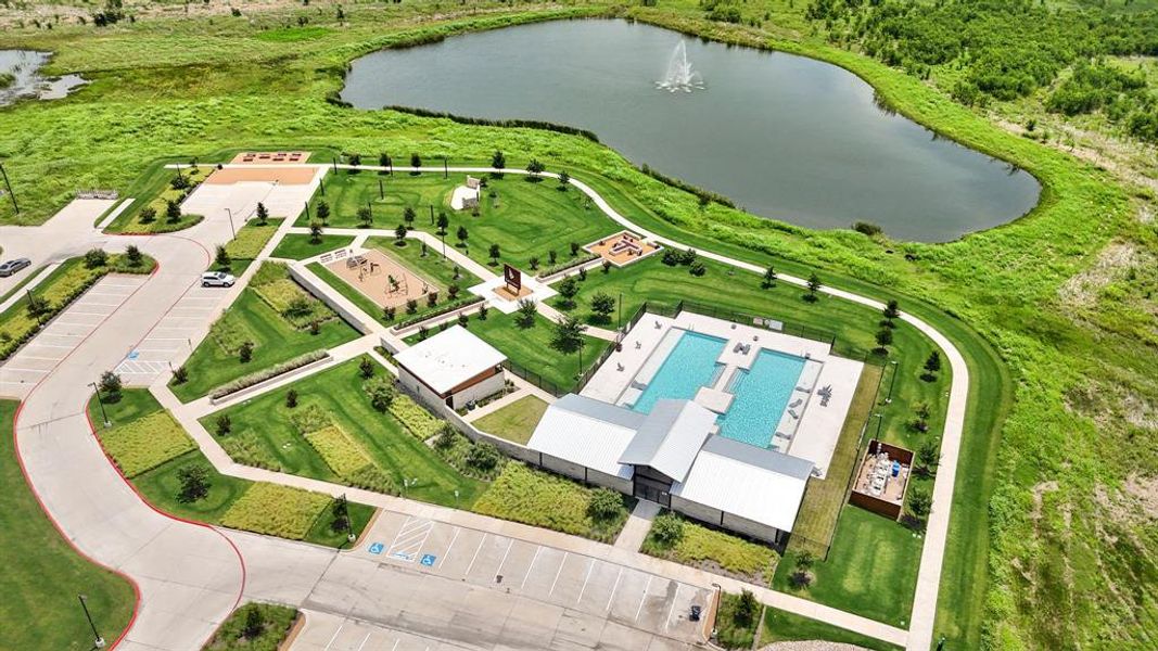 Community amenities including a swimming pool with lounge areas, a playground, and a recreation building Community amenities including a swimming pool with lounge areas, a playground, and a recreation building