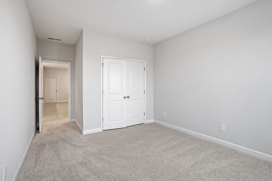 Spacious, unfurnished interior of a new home in Ovation at Sweetbrier, Durham (Image 22).