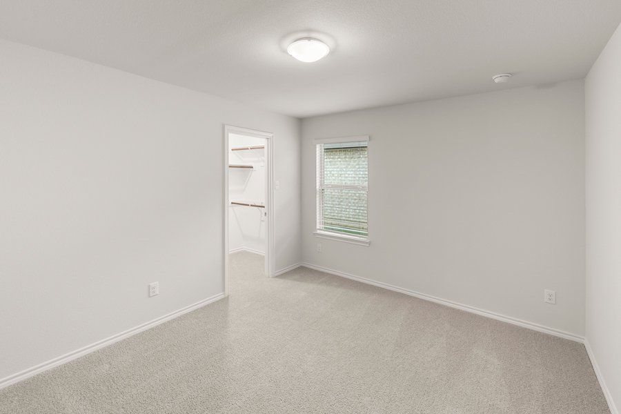 Representative exterior photo of a completed home built from the Cheyenne by Impression Homes in DeBerry Reserve, Royse City, TX (Image 15).