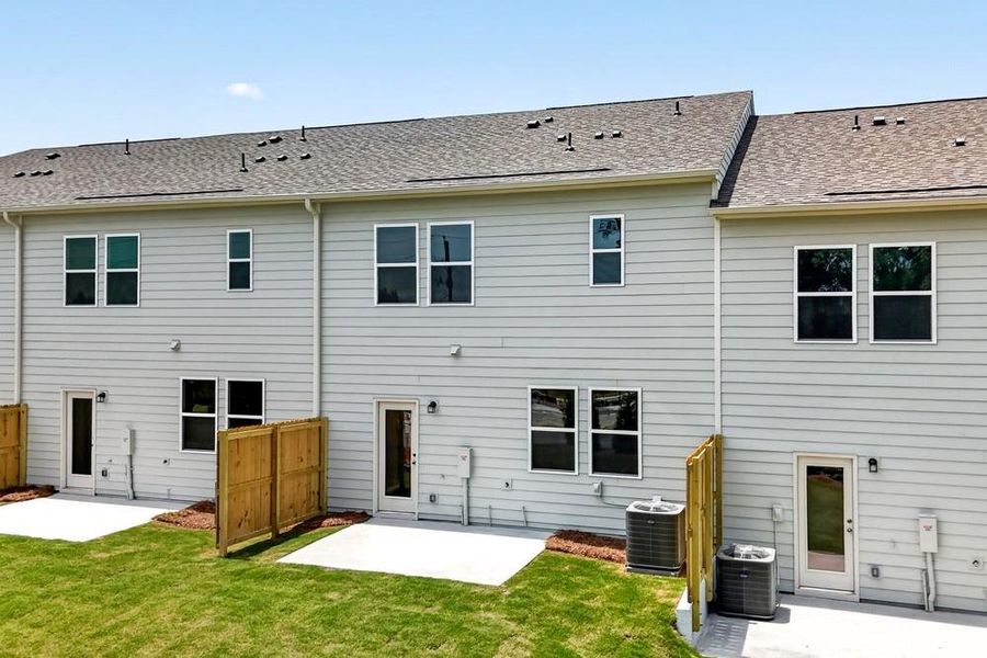 Exterior details and patio area of a home in Weatherfield, Buford (Image 25).