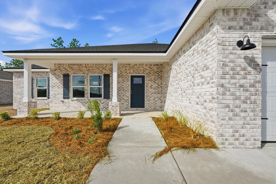 Exterior details and patio area of a home in Southern Charm, Crestview (Image 23).