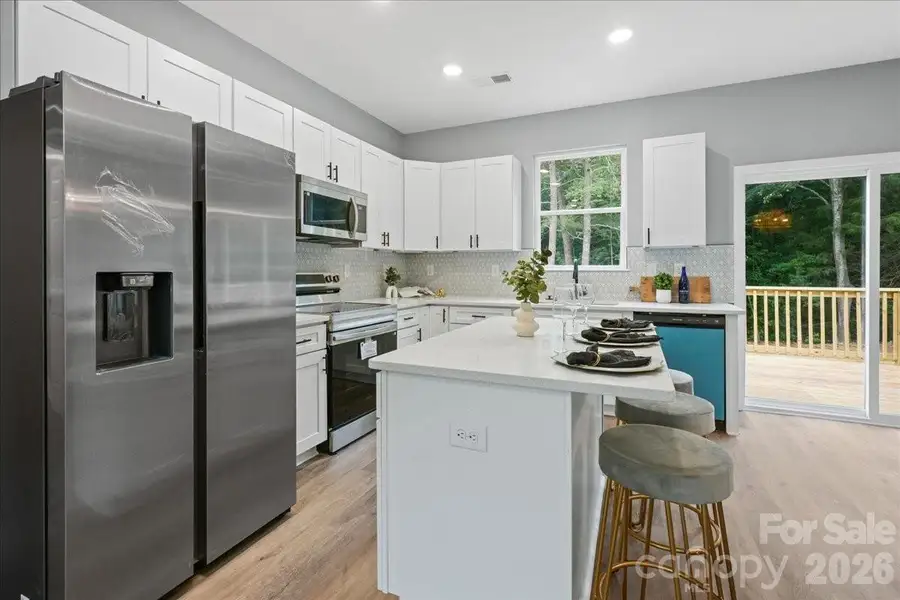 Furnished interior view inside a new home in , Statesville (Image 9).