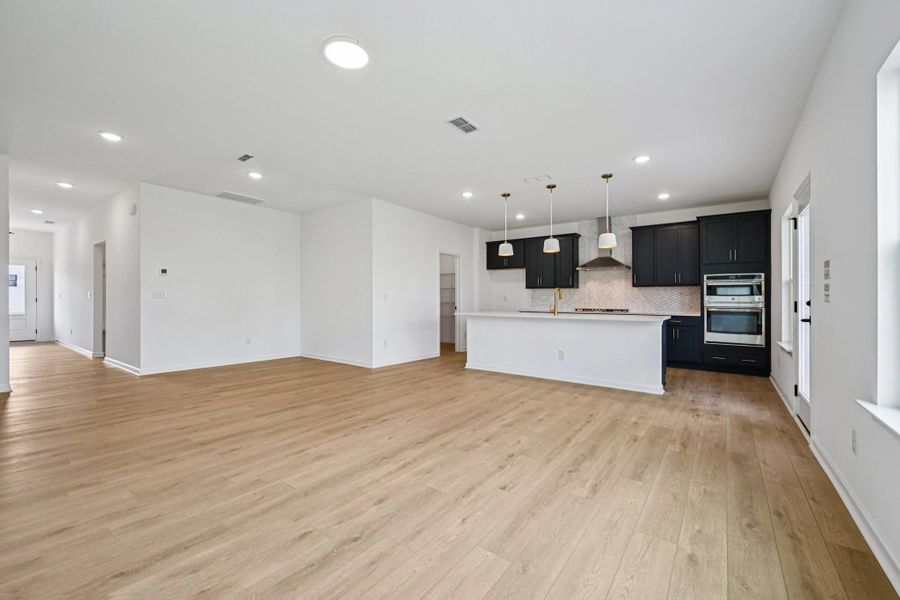 Family Room featuring the AW Collection® Sapphire - Bold tones and playful patterns shine here. Family Room featuring the AW Collection® Sapphire - Bold tones and playful patterns shine here.