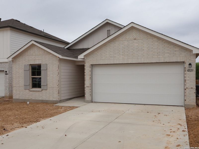 Front exterior of a new home in Agave, San Antonio, TX, highlighting curb appeal (Image 22). Front exterior of a new home in Agave, San Antonio, TX, highlighting curb appeal (Image 22).