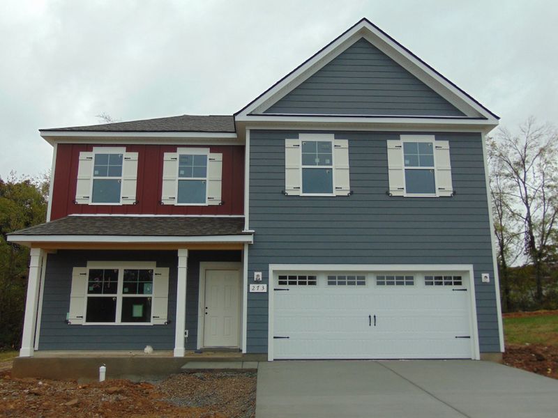 Front exterior of a new home in Finch Branch, La Vergne, TN, highlighting curb appeal (Image 1). Front exterior of a new home in Finch Branch, La Vergne, TN, highlighting curb appeal (Image 1).