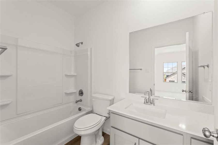 Furnished interior view inside a new home in Creekview Fossil Ridge, Pilot Point (Image 5).